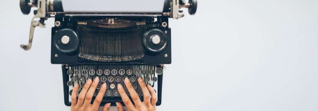 What is screenwriting blog_hands on an old typewriter