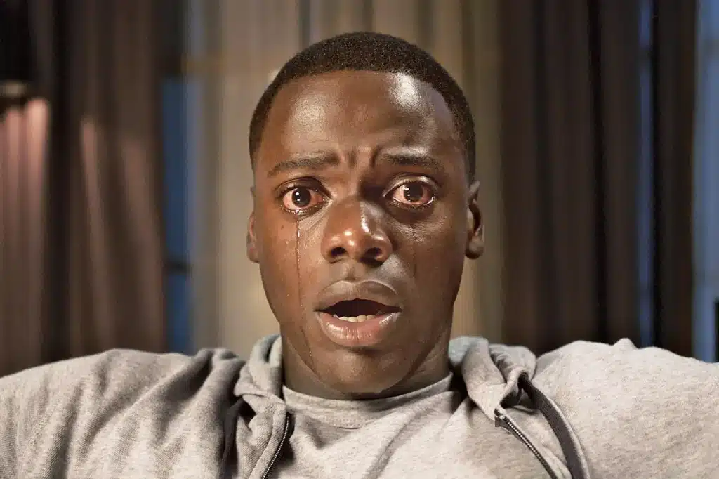 A still from the 2017 film Get Out, being used as an example of what a feature film is.